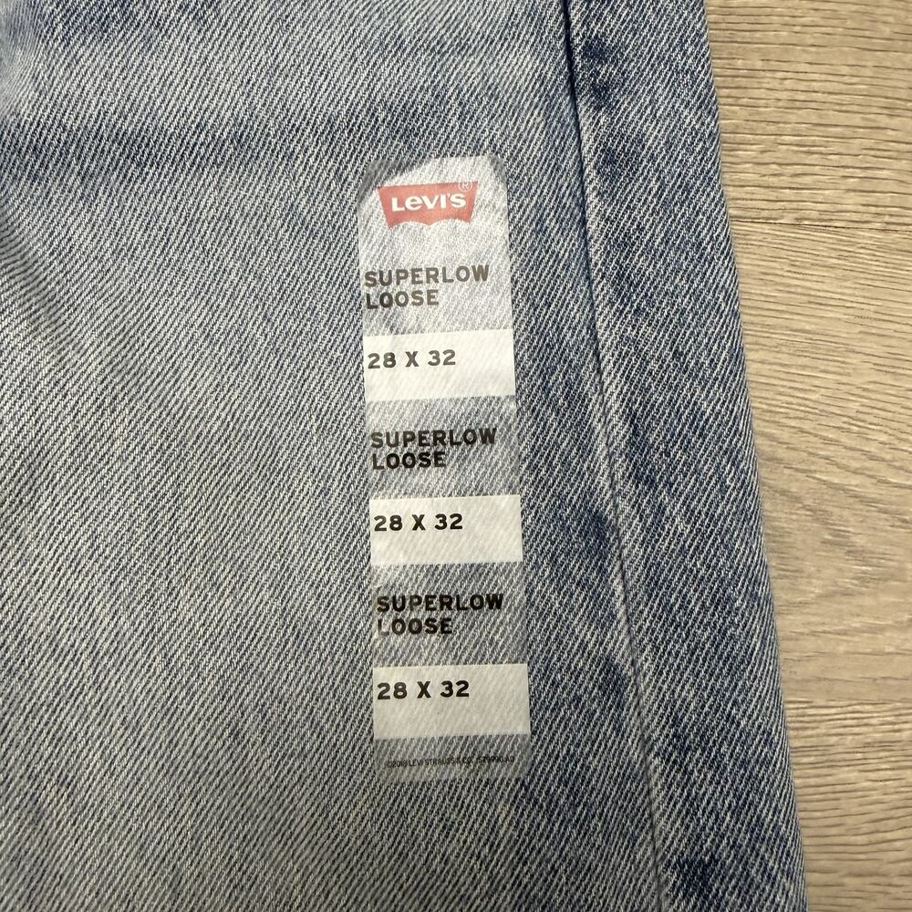 Levis Superlow Loose Jeans Womens 28x32 NWT Light Wash Distressed Wide Leg - Picture 3 of 13